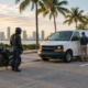 Work van and motorcycle after a collision illustrating Miami motorcycle accident employer liability